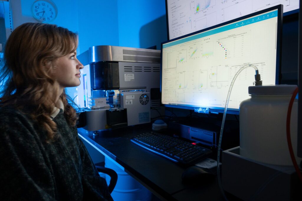 Person looks at computer screen